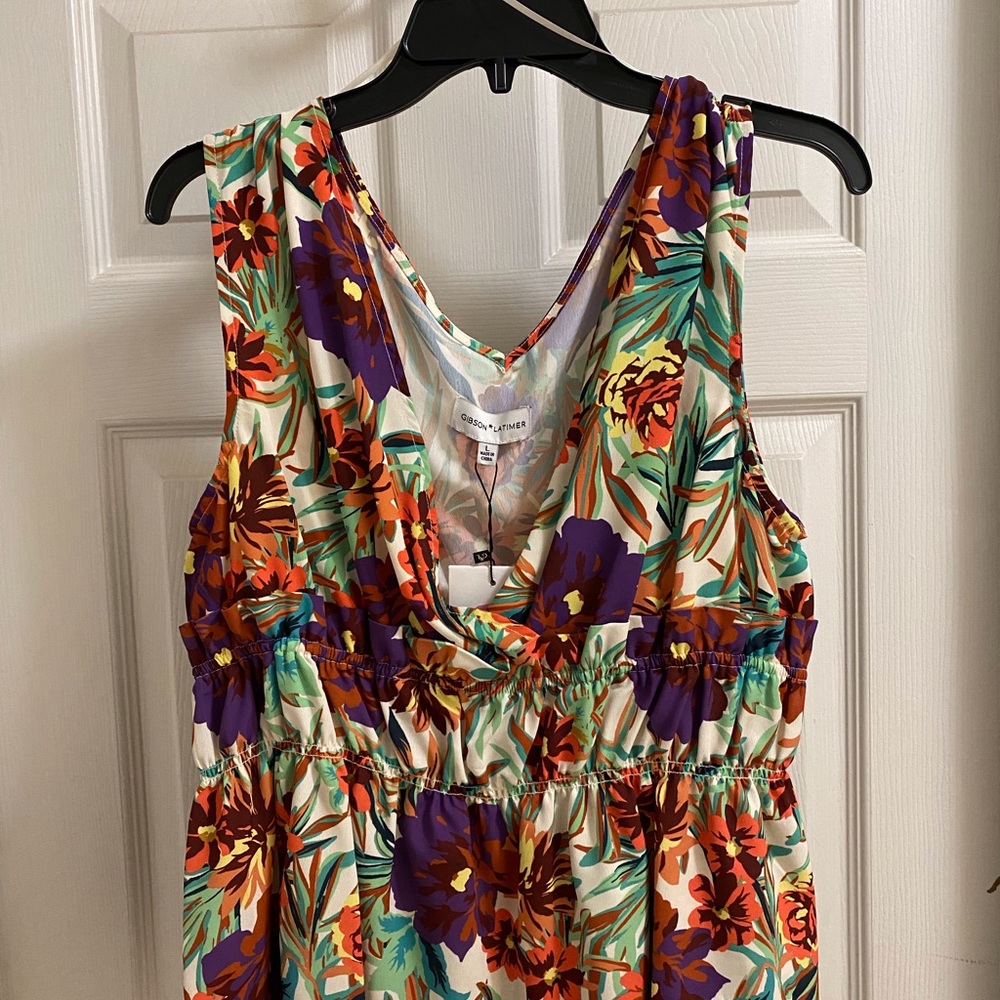 Brightly colored floral blouse.